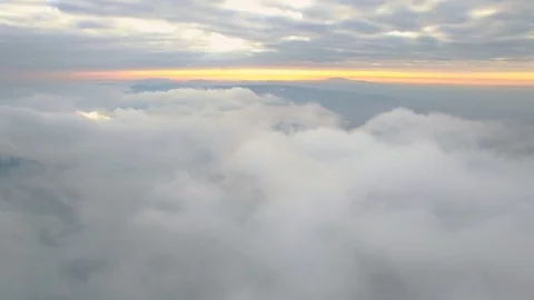 Aerial Flight Over Sunset Cloud Inversion In Mountains Video stock 79697778