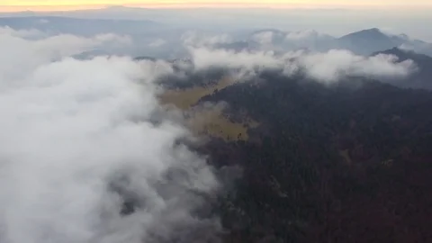 Aerial Flight Over Sunset Cloud Inversion In Mountains Video stock 79697818
