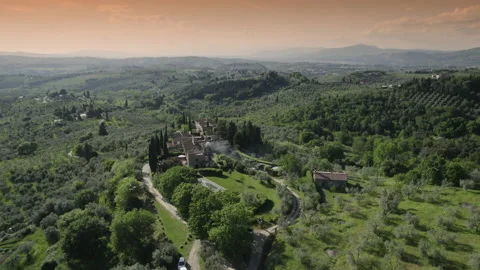 Aerial flight over a typical landscape of the Tuscan countryside Stock Footage 153852659