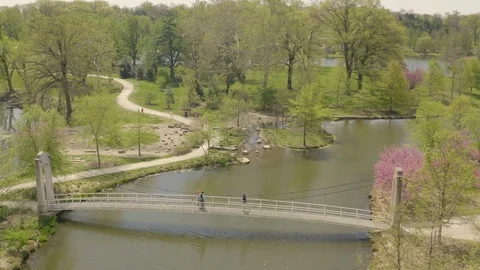 Aerial flight over a walking bridge Stock Footage 107614459