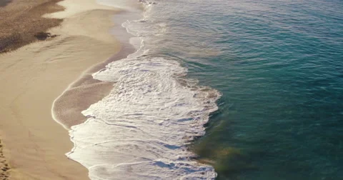 Aerial Flight Over White Sandy Beach and Beautiful Blue Ocean. Amazing Sunris Video stock 56339899