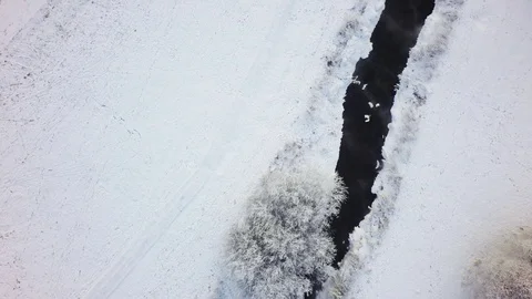 Aerial flight over winter forest and suburbs 17 Stock Footage 121328038