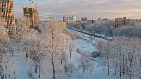 Aerial flight over winter forest and suburbs 27 Stock Footage 121328772