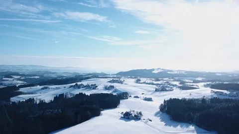 Aerial flight over winter landscape with modern architecture pyramid Stock Footage 83564378