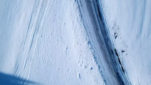 Aerial flight over winter landscape with modern architecture pyramid Stock Footage 83568190