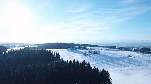 Aerial flight over winter landscape with modern architecture pyramid Stock Footage 83568694