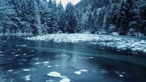 Aerial flight over winter landscape in ebensee austria Stock Footage 83633409