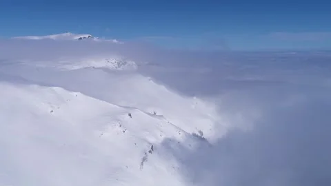 Aerial  Flight Over Winter Mountain Covered With Snow Stock Footage 150679930