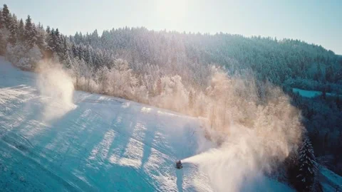 AERIAL: Flight Over Working Snow Makers and Frosted Winter Forest Vidéo 140295786