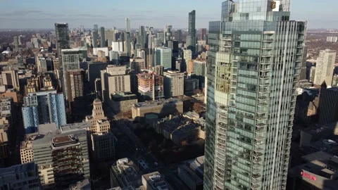 Aerial flight really close to downtown Toronto Skyscraper Stock Footage 151921659