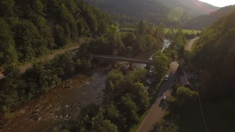 Aerial flight river and a bridge Stockbeeldmateriaal 99643003