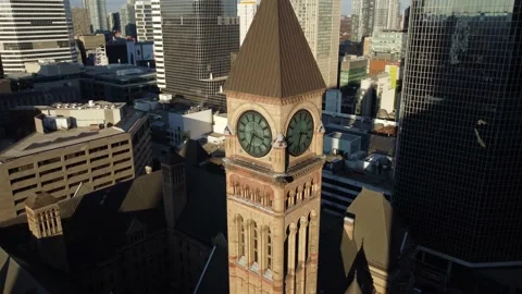 Aerial flight rotating around the clock tower of Old City Hall in Downtown Toron Stock Footage 151922485