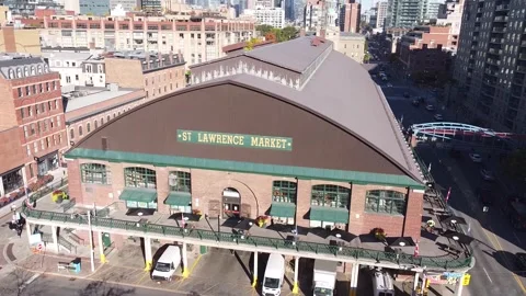 Aerial flight rotating around the front of the St Lawrence Market in Toronto as  Stock Footage 151934050