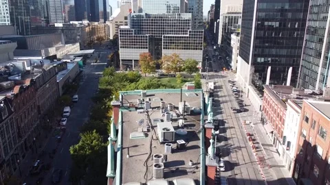 Aerial flight straight backwards over the tip of the Gooderham Building or Flati Stock Footage 151934855