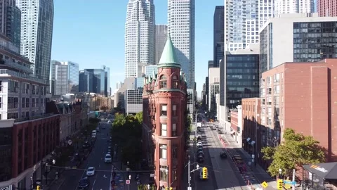 Aerial flight straight backwards while looking at Gooderham or Flatiron building Stock Footage 151934816