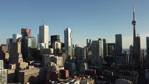 Aerial flight straight down looking southeast at the Toronto skyline as the sun  Stock Footage 151922055