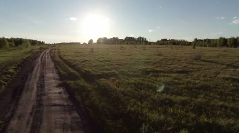 Aerial Flight to Sunset in Rural Stock Footage 39773193