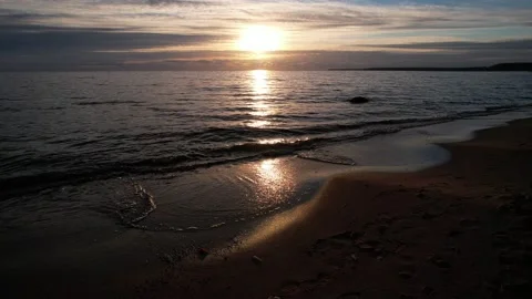 Aerial flight at sunset. View along the coastline for sunset at the sea Stock Footage 163702345
