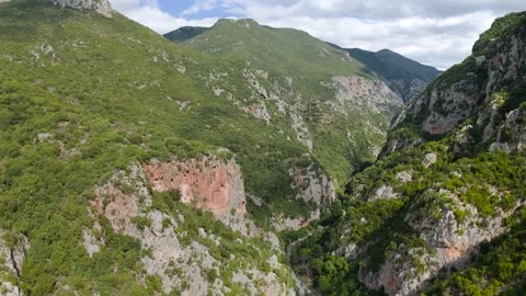 Aerial Flight Through Green Mountain Gorge in Greece Stock Footage 336563420