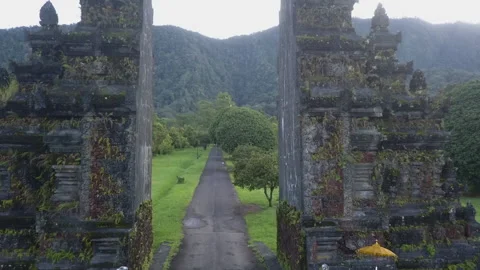 Aerial flight through Handara Gate, a traditional Bali Candi bentar Stock Footage 217688942