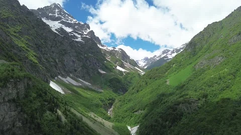 Aerial Flight Through Mountain Gorge With Snow-Dusted Peaks, Georgia, 4K Stock Footage 339301051