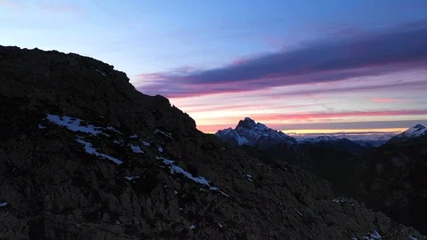 Aerial flight through mountain massive range. UHD outdoor footage Stock Footage 98305013