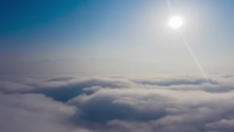 Aerial Flight Through Mountain Mist and Dramatic Sea of Clouds Stock Footage 341910106