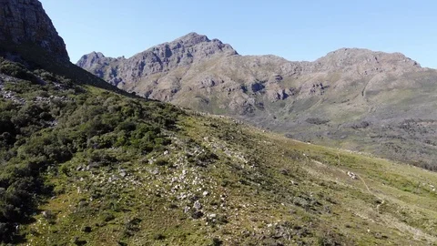 Aerial flight through rugged mountains and valley in south africa Stock Footage 108512289