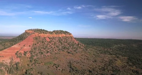 Aerial flight toward Bears Ears red butte on Cedar Mesa Stock Footage 99562156