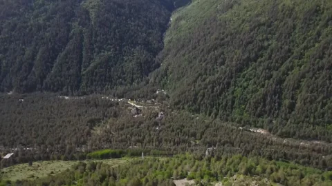 Aerial flight towards a mountain gorge Stock Footage 337048645