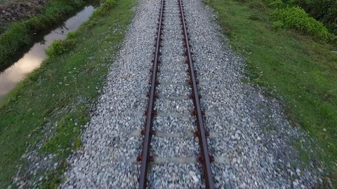 Aerial flight from train tracks Stock Footage 89482096