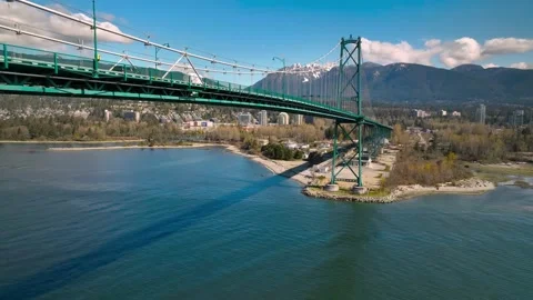 Aerial flight under the lions gate bridge in Vancouver Canada Stock Footage 239074488