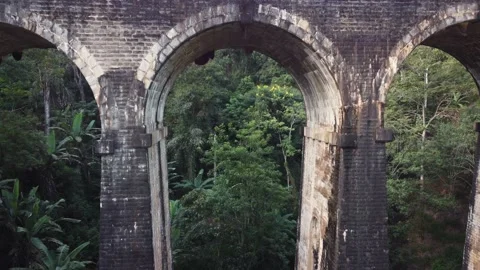 Aerial flight under Nine Arches Bridge, Ella, Sri Lanka Stock Footage 182298096