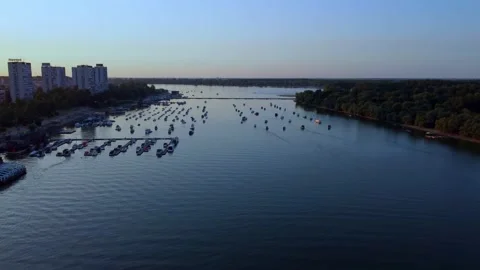 Aerial Flight Upstream on Danube River with Boats and Marina in Zemun Stock Footage 313683649