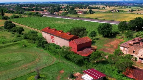 Aerial Flight view above grass Field old country house 4K Tuscany-Italy Stock Footage 242852785