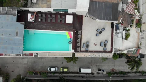 Aerial Flight View of rooftop swimming pool and fly a drone. vacation concept Stock Footage 166406534