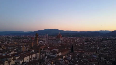 Aerial Florence Duomo pull back sunrise Stock Footage 137082360