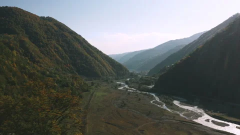 Aerial fly above river between mountains Video stock 172426201