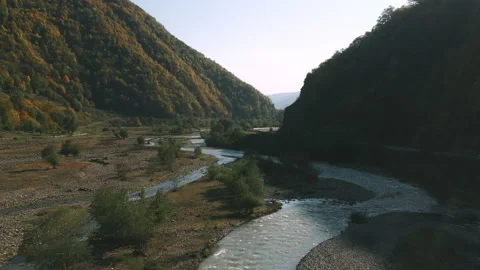 Aerial fly above river between mountains Video stock 172427103