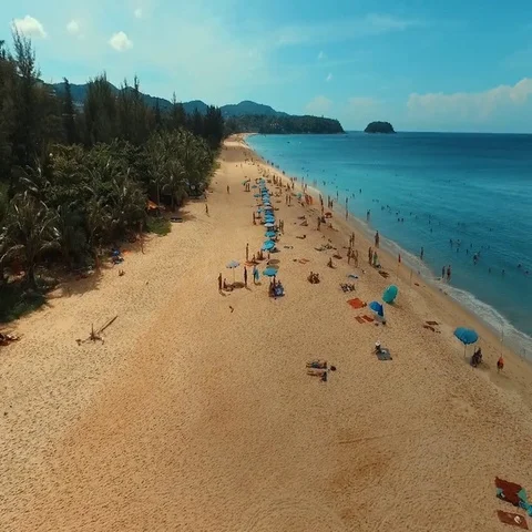 Aerial: Fly away from the beach. Stock Footage 69704396