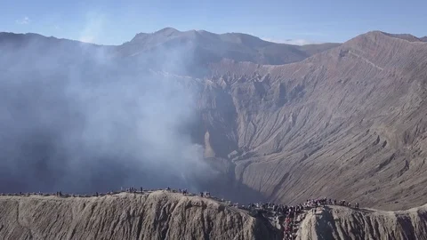 Aerial Fly back from caldera of volcano in Bromo Java Indonesia Stock Footage 84341468
