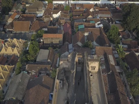 Aerial Fly backwards over ruins hilltop Pulo Cemeti Yogyakarta Java Indonesia Stock Footage 82176129