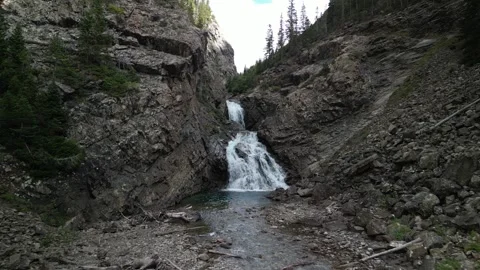Aerial fly forward into Devils Punchbowl waterfall in Crested Butte Colorado Stock Footage 250951928