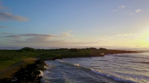 Aerial Fly Over Of Beach With Small Waves At Sunrise 스톡 동영상 78075508