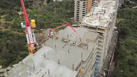 Aerial fly over construction site buildings material on rooftop. High rise .. Stock-Footage 279176875