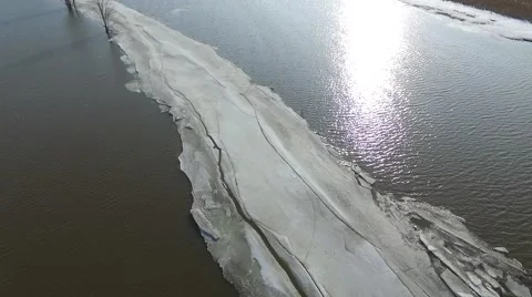 Aerial fly over ice road in flooded field 60fps Stock Footage 61389092