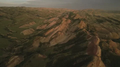 Aerial fly over rainbow or red mountains, colorful layers of the Rainbow Mo.. Stock Footage 309011853