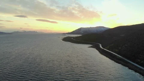 Aerial fly over tilted shot with view of islands and coastal road in northen 스톡 동영상 126538001