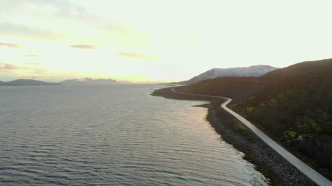 Aerial fly over tilted shot with view of islands and coastal road in northen 库存影片 126538766
