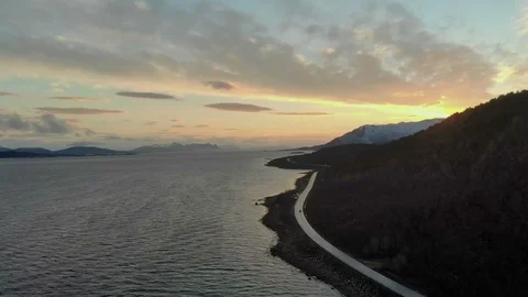 Aerial fly over tilted shot with view of islands and coastal road in northen Video stock 126539985
